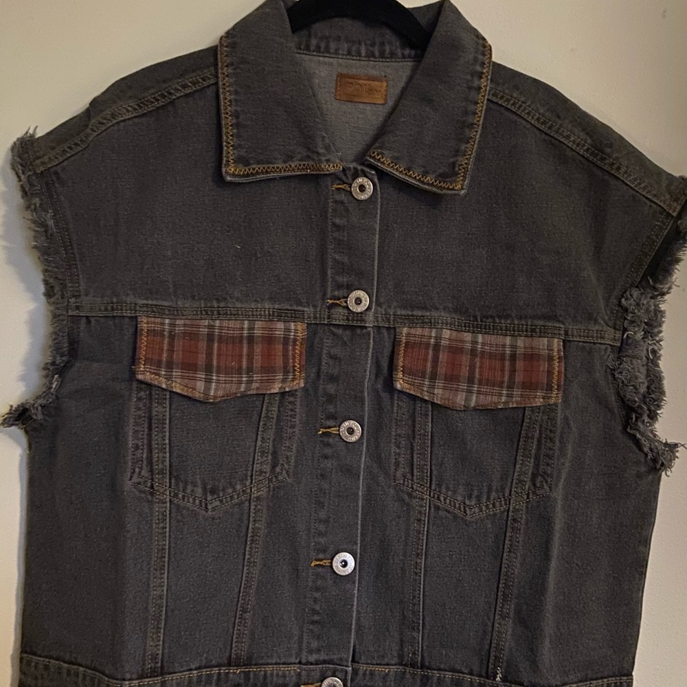 Distressed denim vest